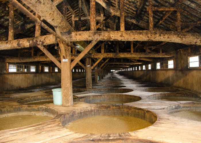 Japanese soy sauce fermenting in vats